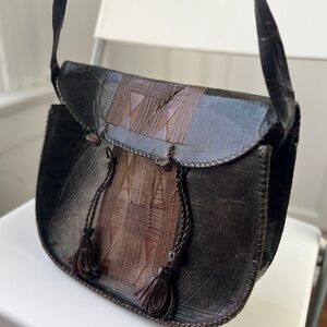 Vintage African Leather Crossbody Pouch with Geometric Panel & Tassel Closures